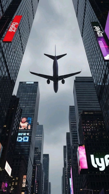 Balance_-_Airplane_between_buildings
