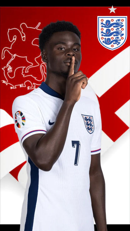 Person wearing a white sports jersey with a logo in the background