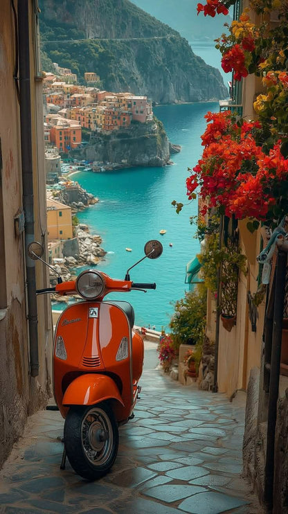 Orange scooter parked on a stone path with a scenic coastal town in the background.