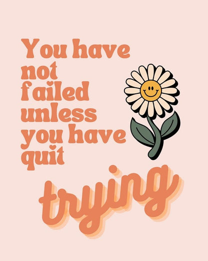 Motivational quote with a smiling flower on a light pink background