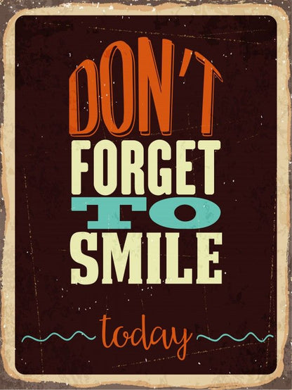 Vintage-style sign with 'Don't forget to smile today' text on a dark background