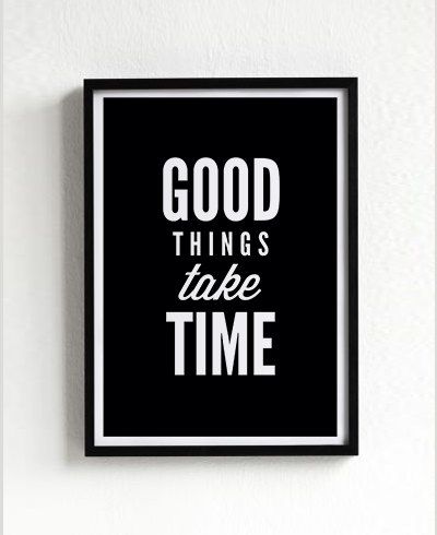 Framed poster with 'Good things take time' text on a white background