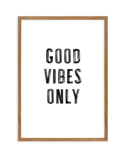 Framed poster with 'Good Vibes Only' text on a white background