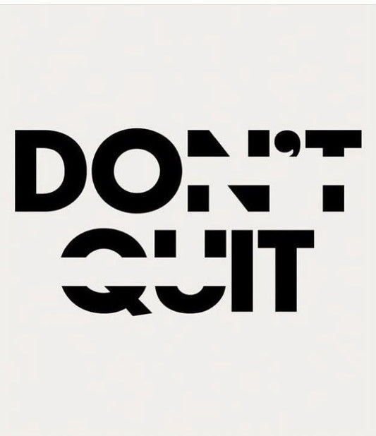 Black text 'DON'T QUIT' on a white background