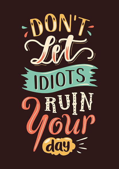 Motivational quote 'Don't Let Idiots Ruin Your Day' with colorful text on a dark background