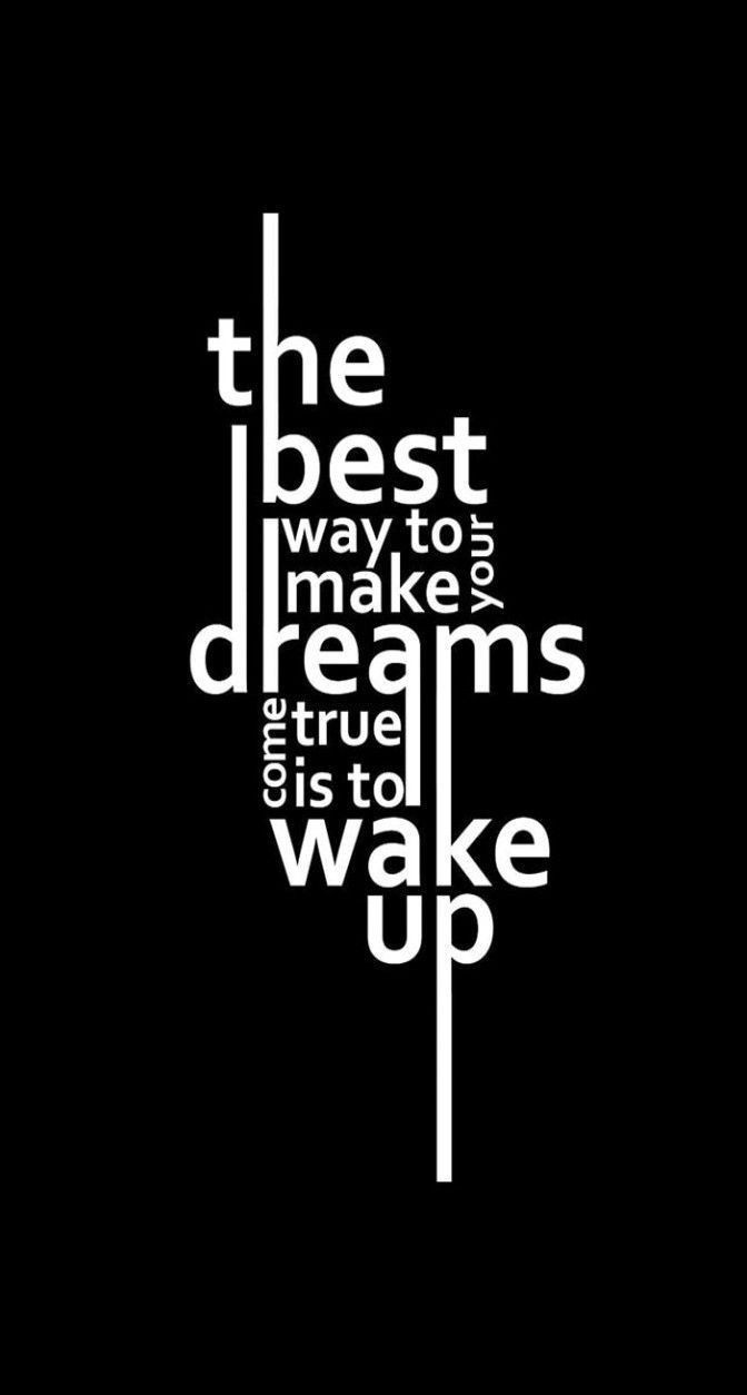 Motivational quote 'The best way to make your dreams come true is to wake up' on a black background